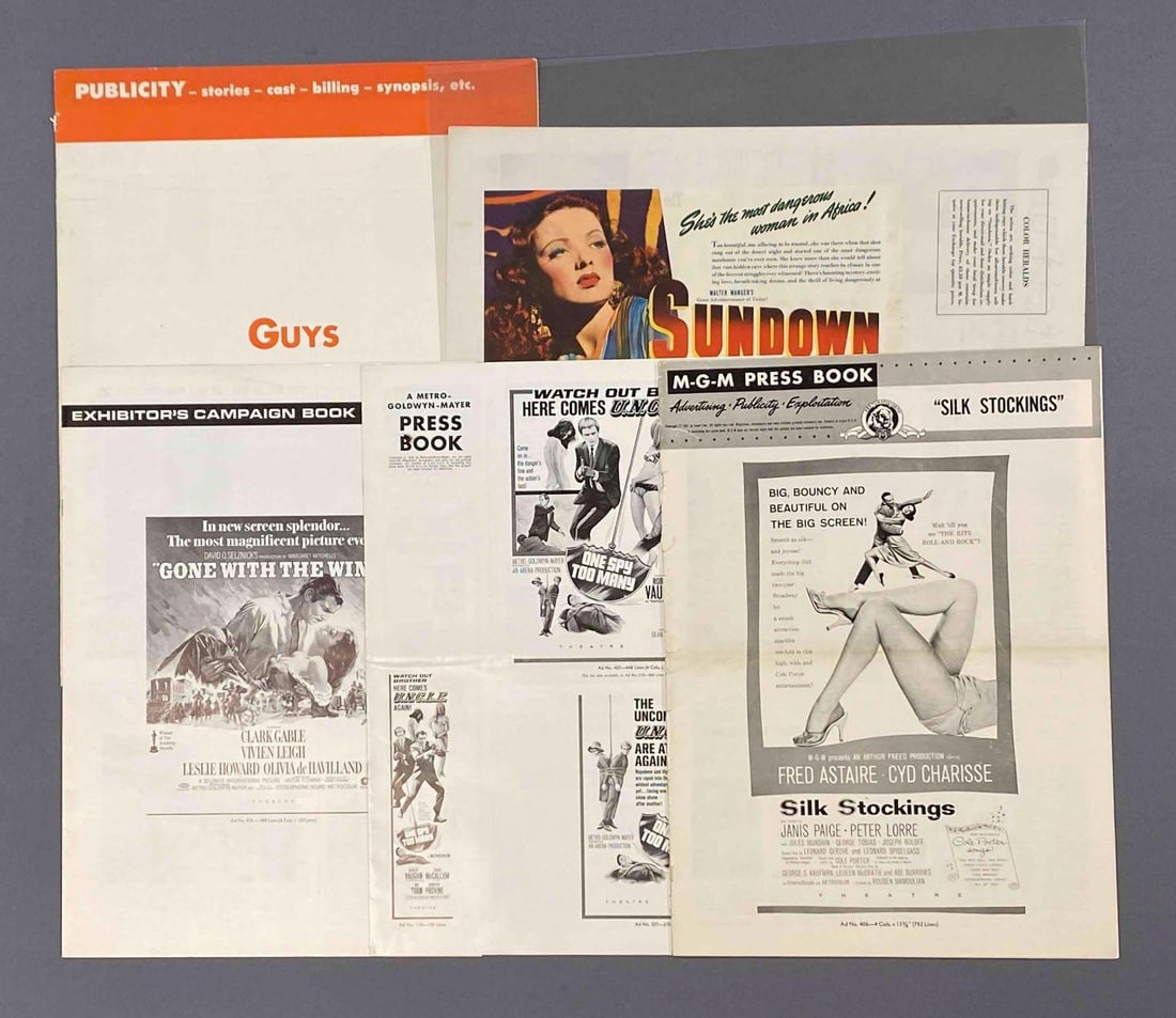 Group of Assorted Press Books: Includes Sun Down, GWTW, Guys and dolls and More, largest measures 18” L x 24” W
