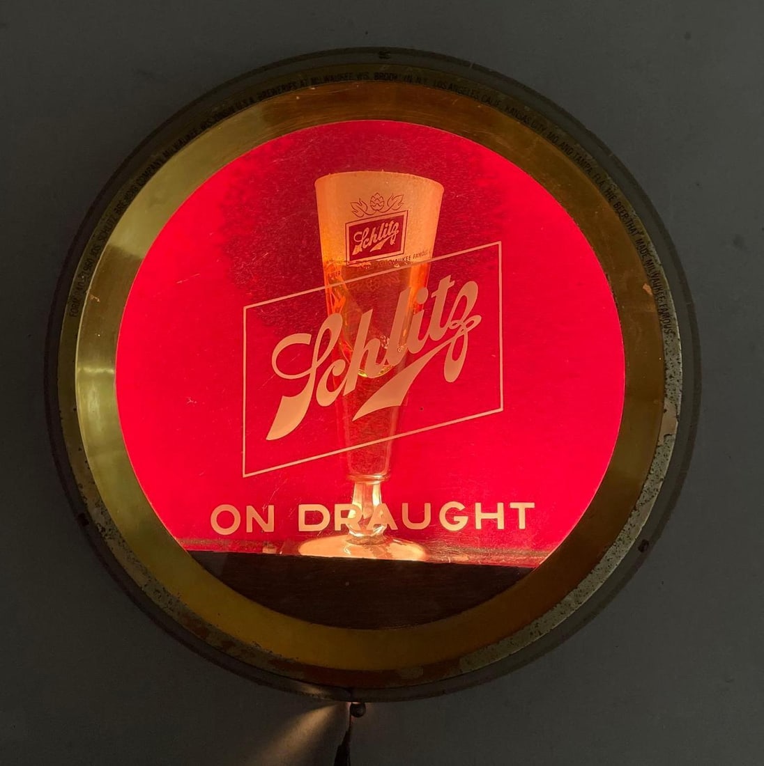 1960 Schlitz on Draught Light-Up Advertising Sign: Working condition, some chips in veneer of barrel, measures H 15 1/2" x D 4 1/4"