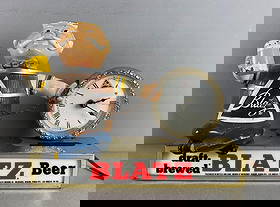 Vintage Blatz Beer Barrel Man Light-Up Advertising Back Bar Clock: Working condition, some paint loss on metal figure, measures H 9" x W 11 1/2" x D 5 1/2"