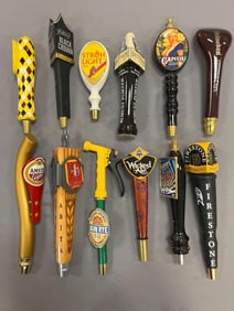 Group of 12 Advertising Beer Tappers