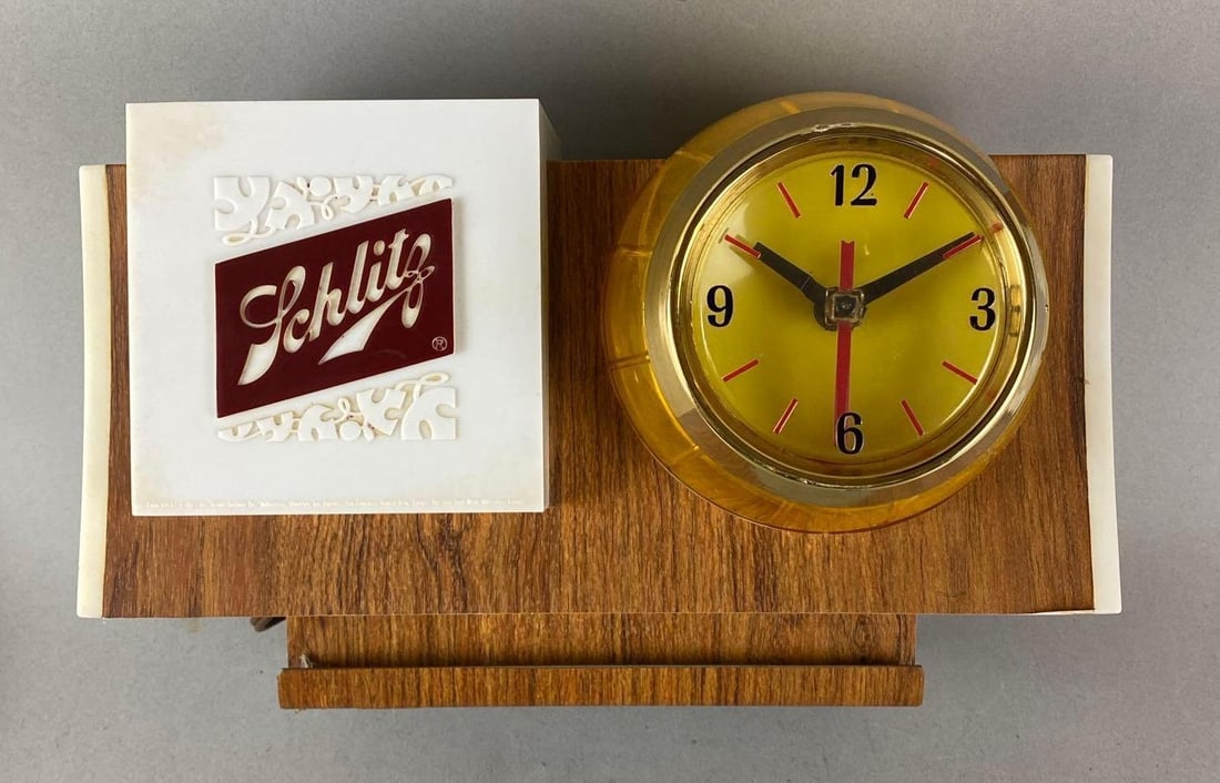 Vintage Schlitz Beer Light Up Advertising Motion Register Topper Clock: In working Condition. Measures H 7 x W 11 x D 6 1/2 inches