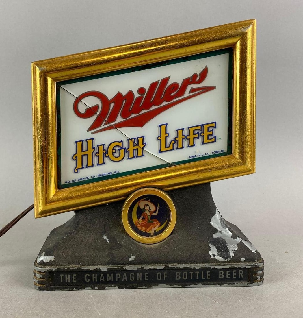 Vintage Miller High Life Light Up Advertising Sign: In working Condition. Does have some paint chipping and cracked glass. Measures H 9 x W 8 x D 4 inches.