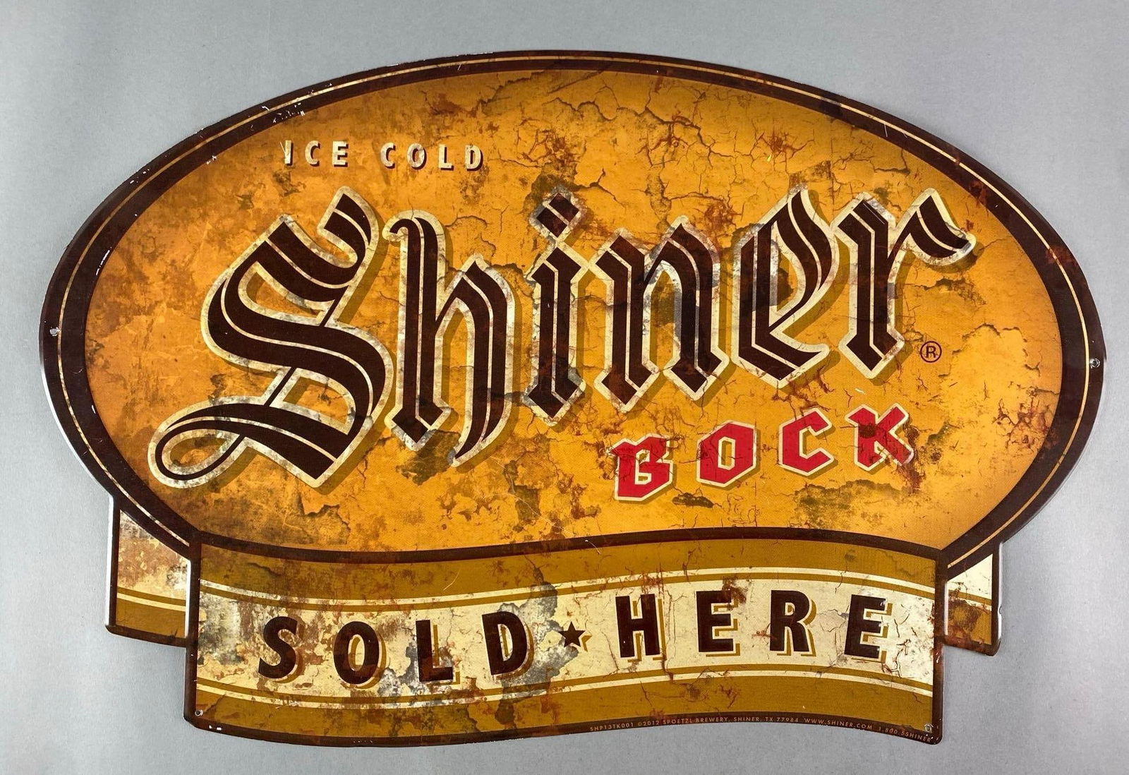 2012 Ice Cold Shiner Bock Beer Embossed Metal Advertising Sign: Faux distressing and age, measures 19 1/2” H x 30” W