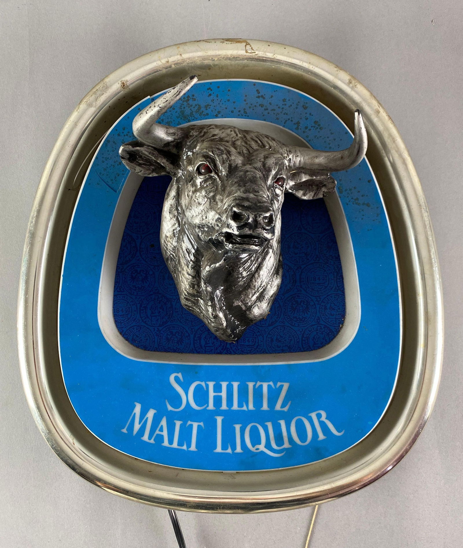 Schlitz Malt Liquor Bull Light Up Advertising Sign: Schlitz Malt Liquor Bull Light Up Advertising Sign, In working condition, measures 17” H x 15 1/2” W x 7 1/2” D