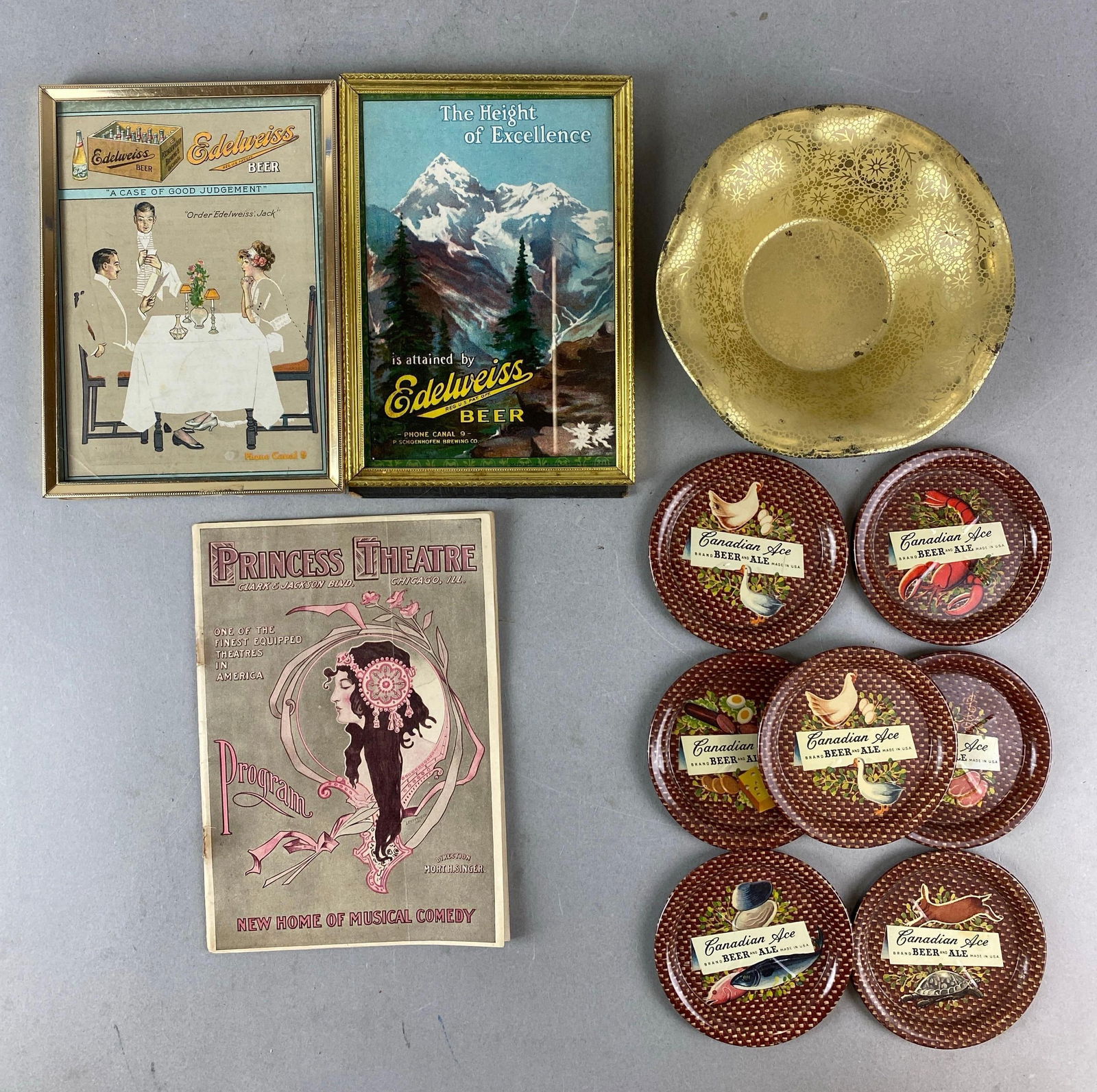 Group of Edelweiss and Canadian Ace Advertising Items: Includes Metal Coasters, Ads and more. Largest item measures H 1 1/2 x W 6 x D 6 inches.