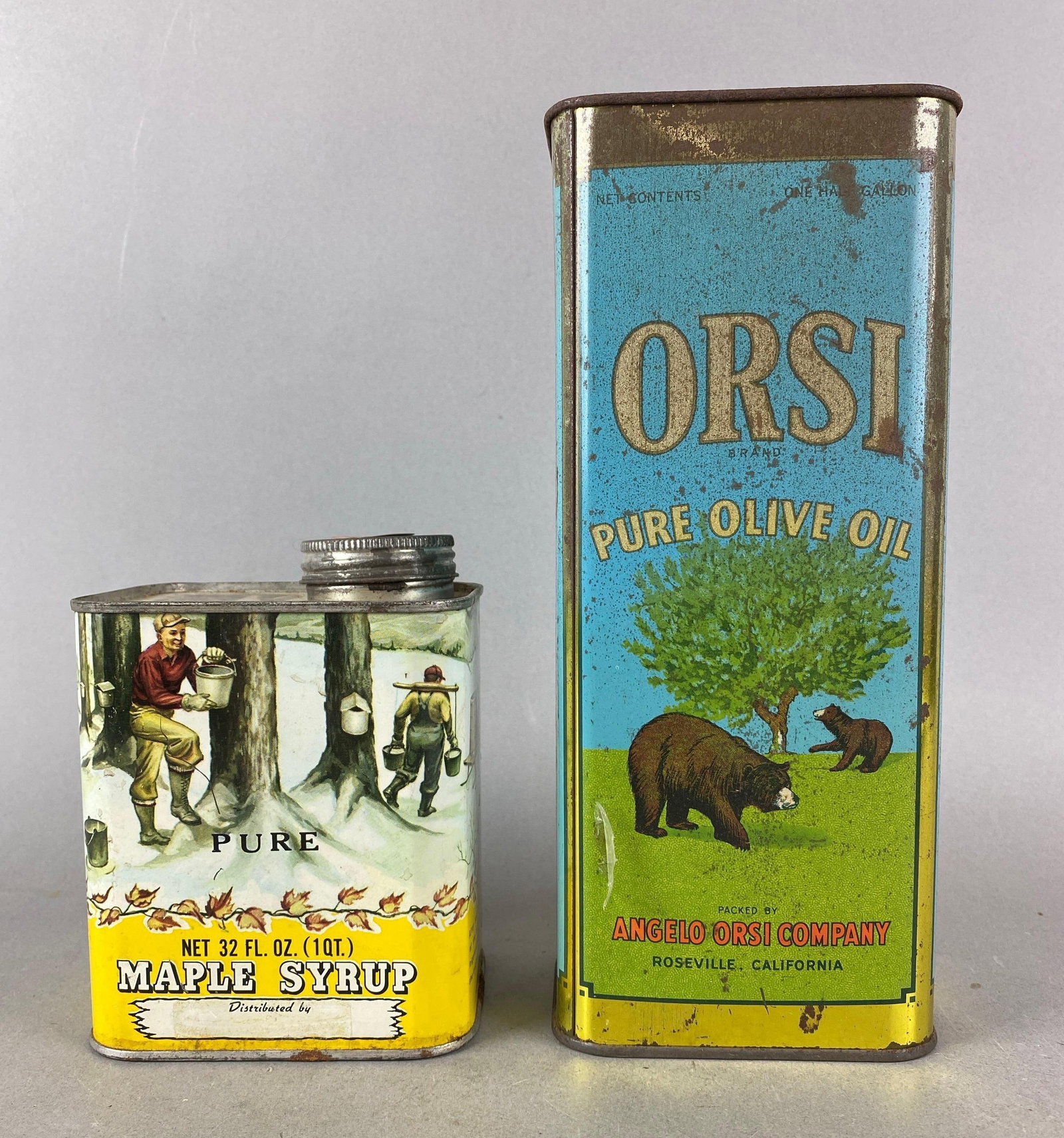 Group of Vintage Advertising Tins: Includes Pure Maple syrup and Oreo Olive Oil. Both have some rust. Largest item measures H 10 x W 4 x D3 1/5 inches.