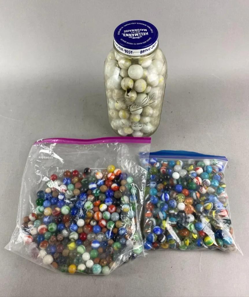 Large Group of Glass Marbles: Jar measures H9 x W4 1/2 xD 4 1/2 inches