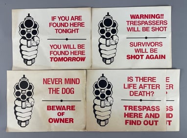 Group of No Trespassing Paper Signs