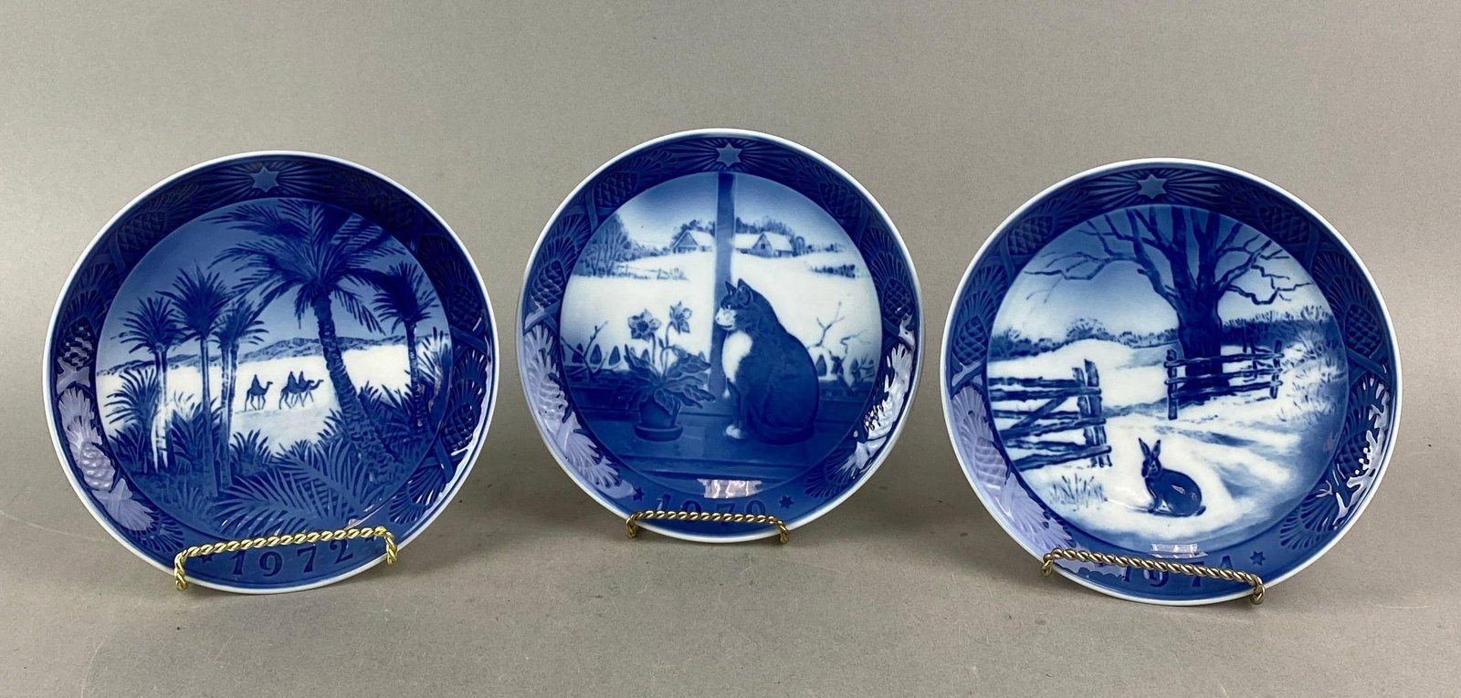 Group of 3 Royal Copenhagen Porcelain Plates: Includes years 1971, 1972 and 1970. Largest measures H1 x W7 1/4 x D7 1/4 inches