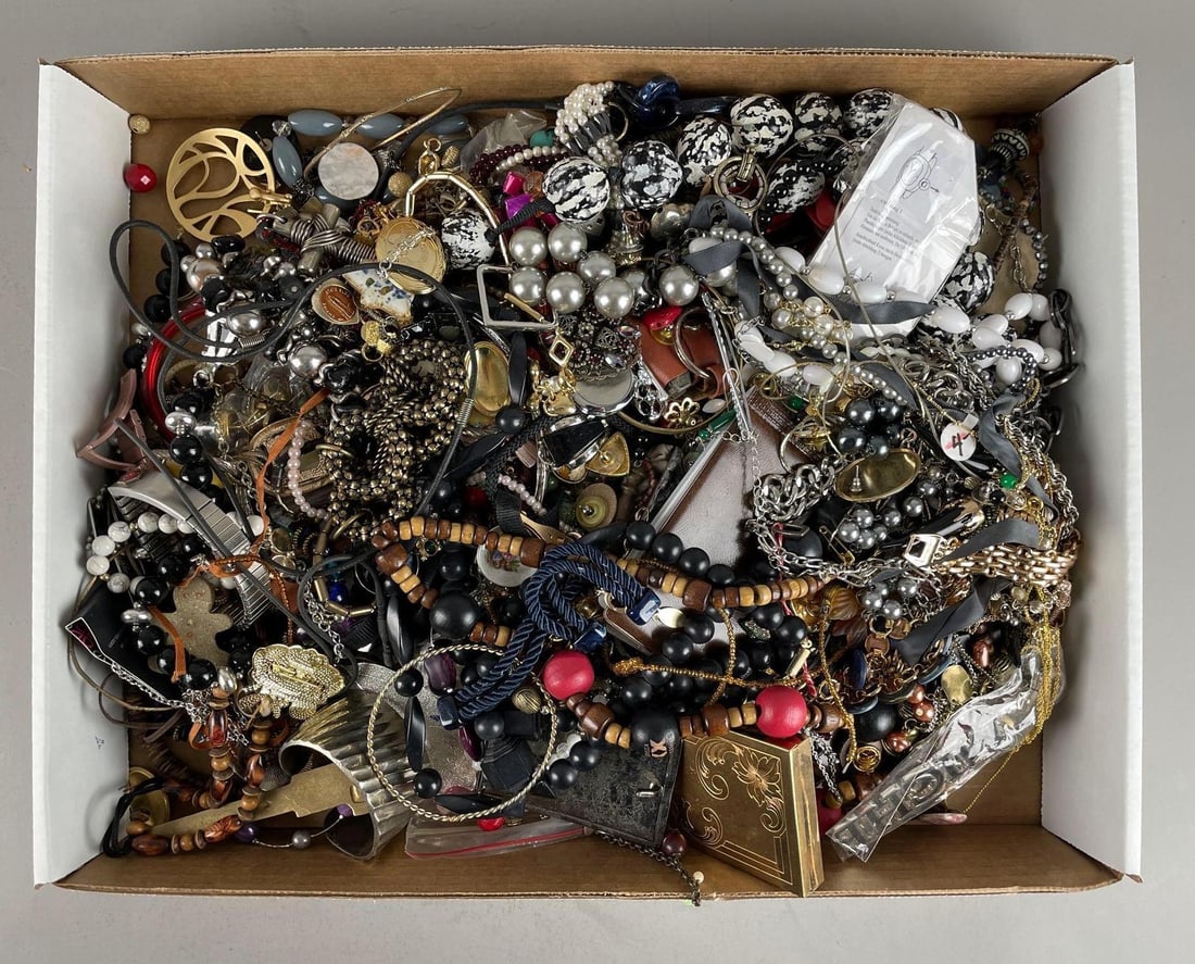 Group of Assorted Costume Jewelry: Includes necklaces bracelets, earrings