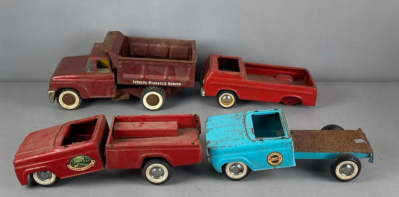 Group of Ny-Lint and Structo Pressed Steel Toy Trucks (1 of 3)