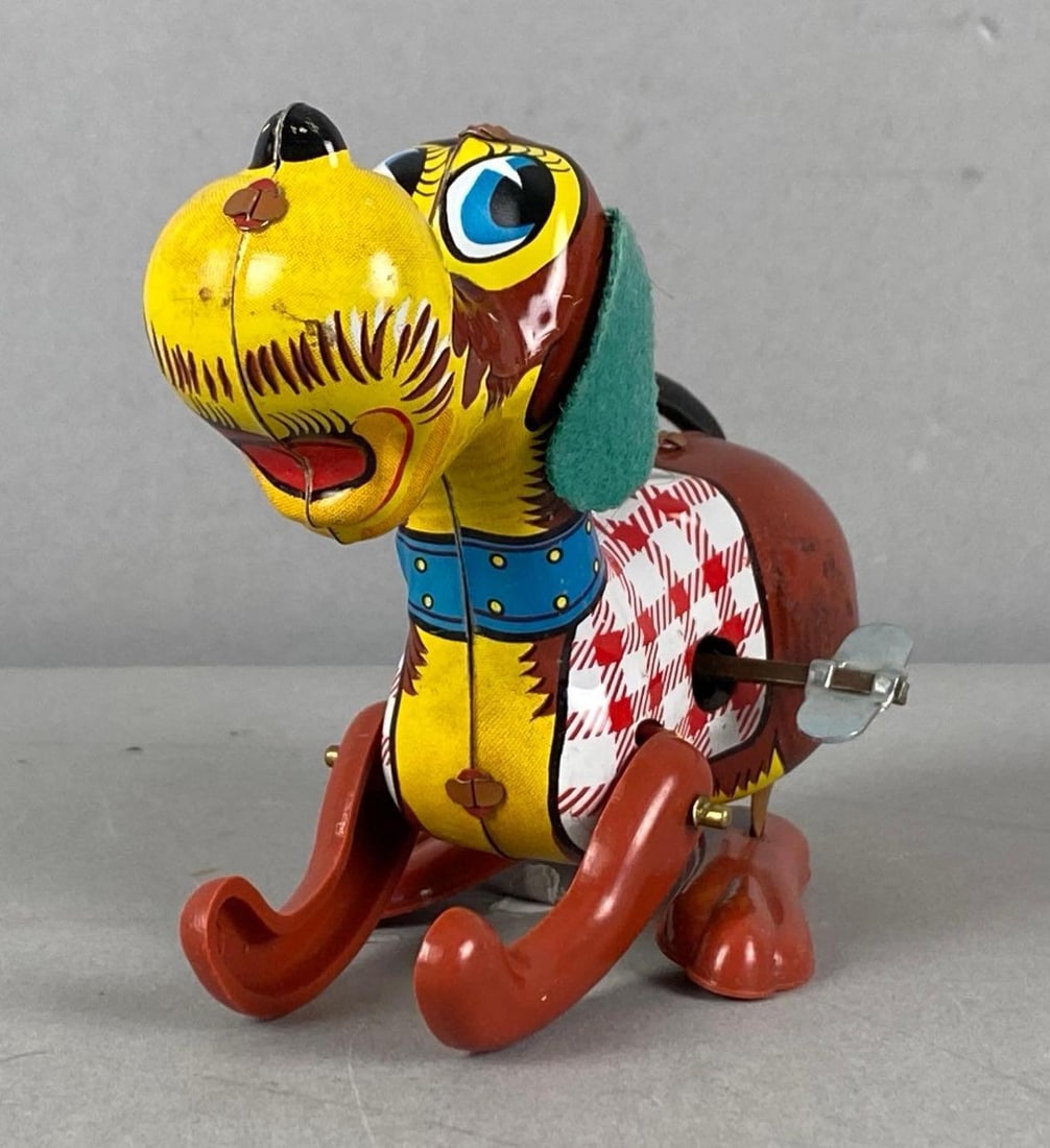 Vintage Japanese Tin Litho Jumping Dog Toy: In working condition, measures 2 1/2” H x 2 3/4” W x 4 3/4” D
