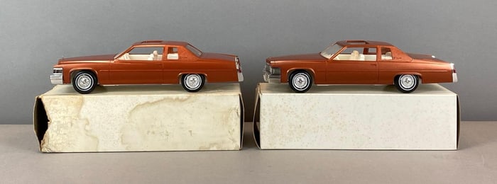 Group of 2 Jo-Han 1977 Cadillac DeVille Saffron Dealership Promo Car