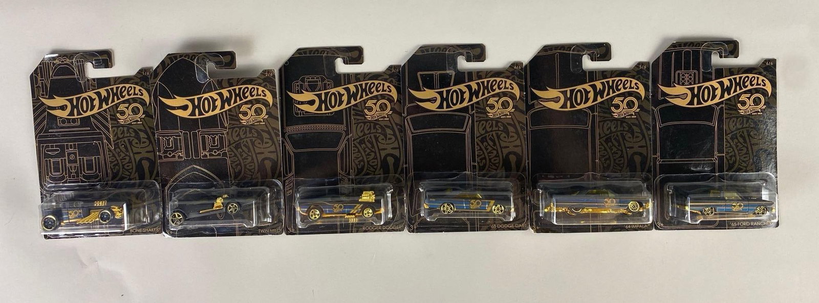 Set of 6 Hot Wheels 50 Challenging The Limit Die-Cast Cars: Set of 6 Hot Wheels “ 50 Challenging The Limit Since 1968” die-cast vehicles. New in packaging.
