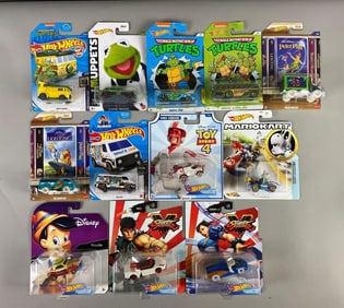 Group of 12 Various Character's Hot Wheels Die-Cast Vehicles