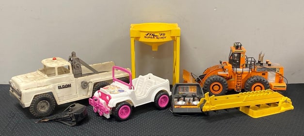 Group of Plastic Toy Vehicles and More