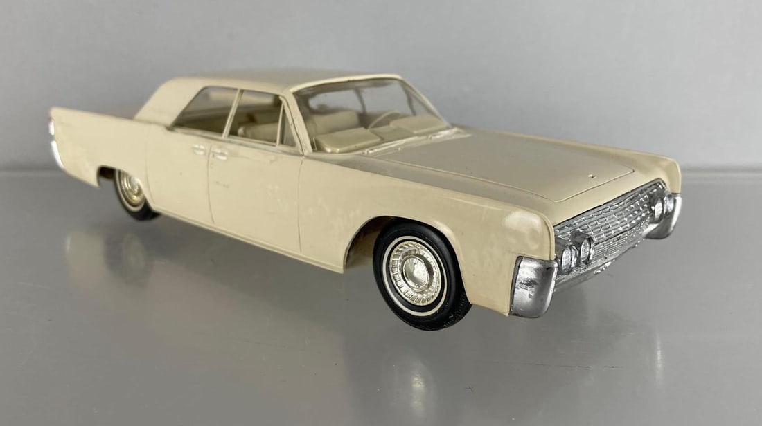 1962 Lincoln Continental 4 Door Sedan Champagne Dealership Promo Car: Coaster, missing hood ornament, discoloration, scuffs,
