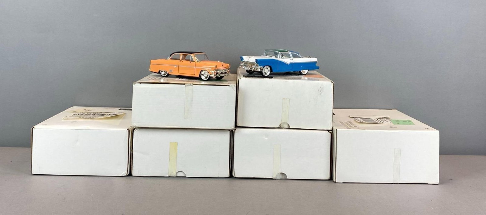 Group of ARKO Classic Ford and Cadillac Die-Cast Cars: like new in original boxes, inclufrs 1956 Ford Fairlane Crown Vic, 1947 Cadillac series 62 and more, all 1/43 scale