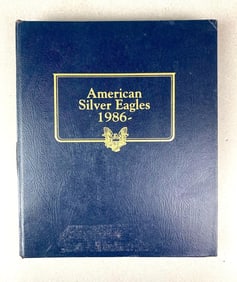 Group of 23 US Mint American Silver Eagles in a Whitman Album