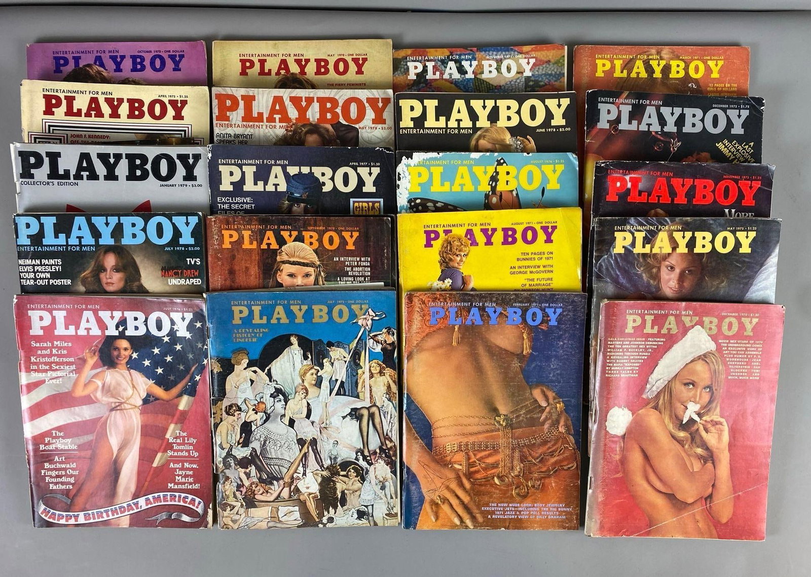 Group of 20 Vintage Playboy Magazines: Rips and tears throughout, Circa 1970s