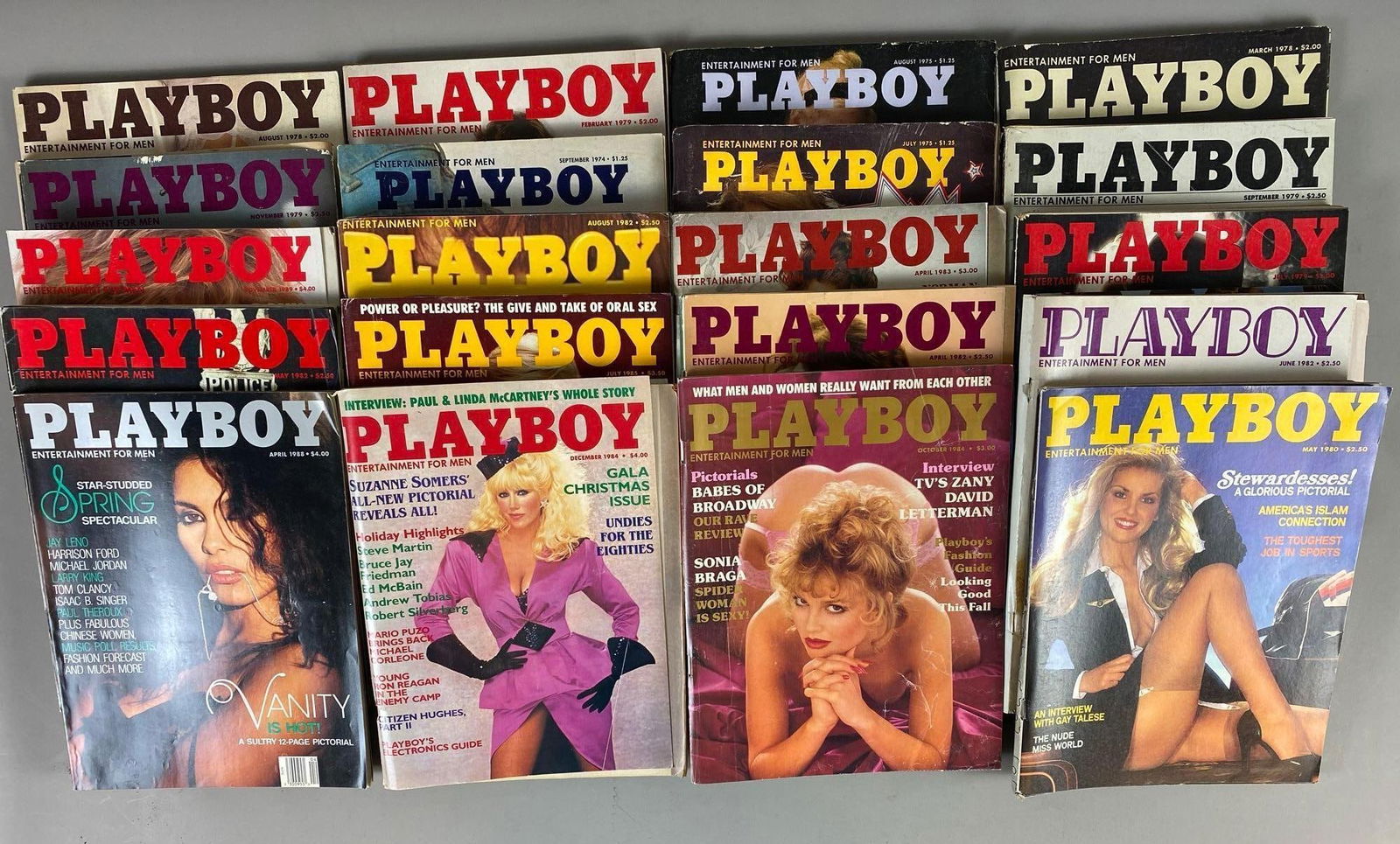 Group of 20 Vintage Playboy Magazines: Rips+ tears throughout circa 70’s and 80’s