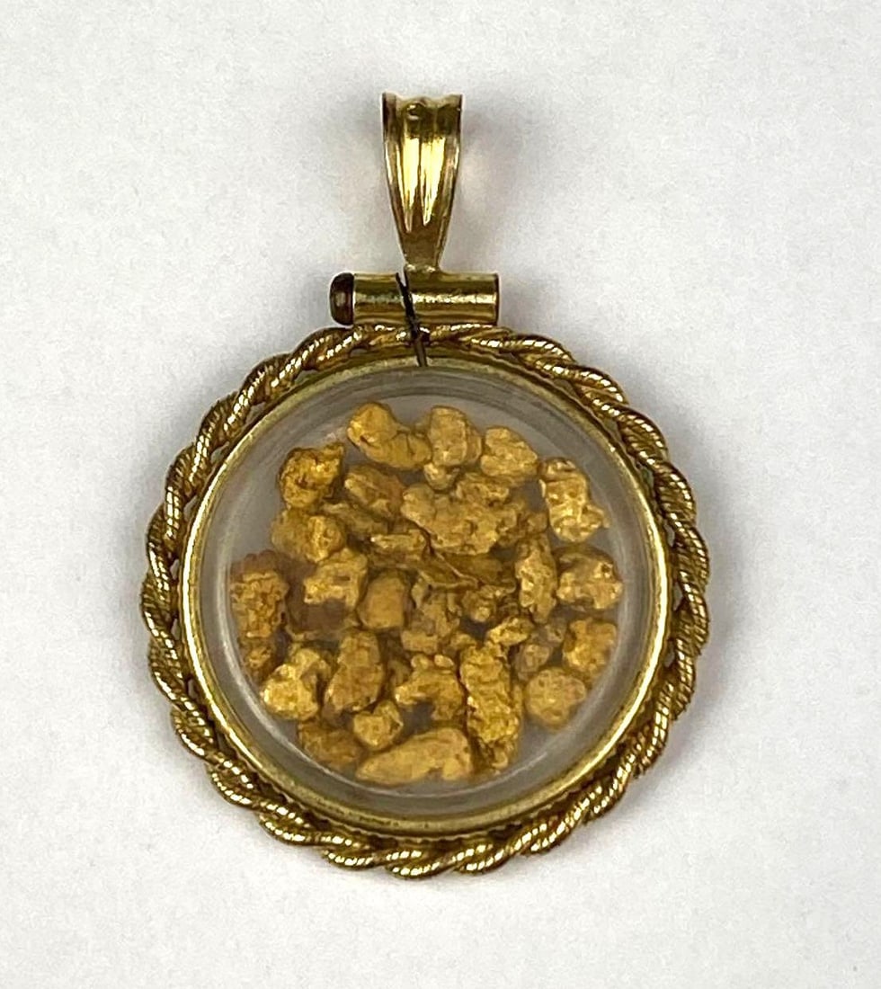12/20 Gold Filled Gold Nugget Pendant: Total weight 3.4 grams. Pendant measures H 1 1/4 x W 3/4 x D 1/4 inches