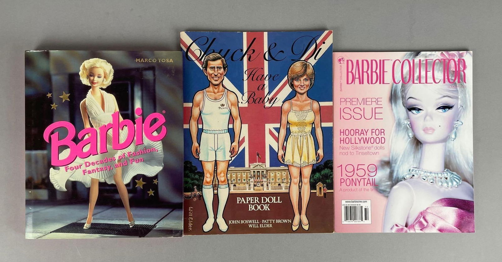 Group of Barbie Doll Books and More: Includes chuck and Di have a baby paper doll book, measures 12" x 9"