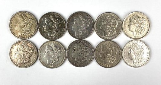 Group of 10 US Morgan Silver Dollars
