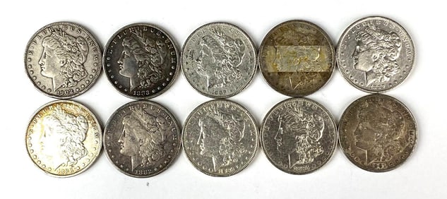 Group of 10 US Morgan Silver Dollars