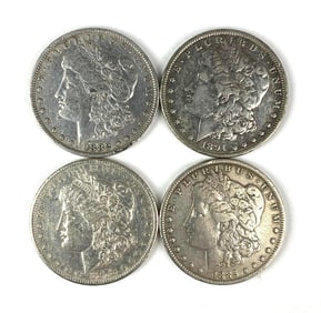 Group of 4 US Morgan Silver Dollars