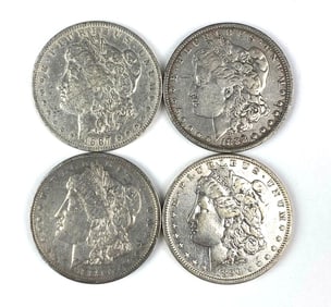 Group of 4 US Morgan Silver Dollars