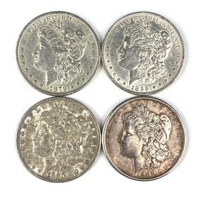 Group of 4 US Morgan Silver Dollars