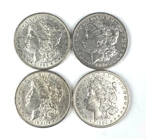 Group of 4 US Morgan Silver Dollars