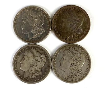 Group of 4 US Morgan Silver Dollars