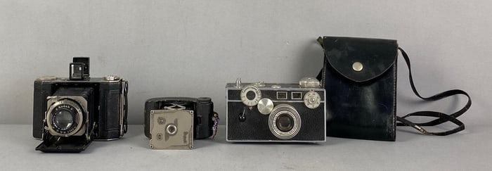 Group of Vintage Film Cameras and Leather Bag