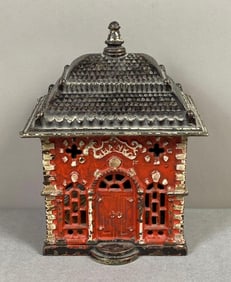 Antique Cast Iron Painted Coin Bank building by J.& E. Stevens