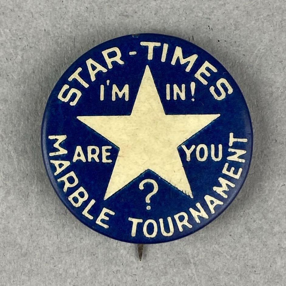 Vintage Star Times Marble Tournament Pin Back: Measures H 1 1/4 x W 1 1/4 inches.