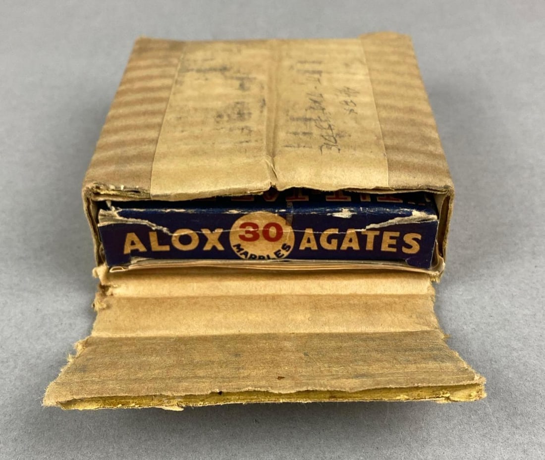 Vintage Box of Tit Tat Toe Marble Game: In original packaging. Alox Agates Marbles. Packaging measures H 1 1/2 x W 4 1/4 x D 4 inches.