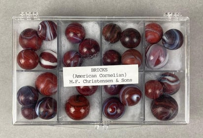 Group of Antique M.F. Christensen and Sons Brick American Cornelian Marbles