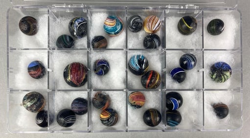 Group of 29 Indian Swirl Black Banded Opaque Glass Marbles