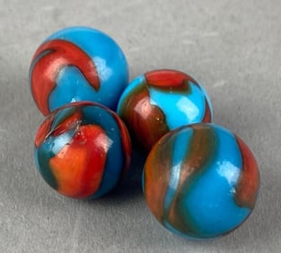 Group of 4 Peltier Glass Co. Spider-Man Glass Marble