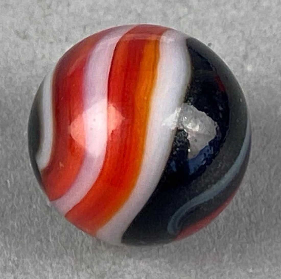Peltier Glass Co. Rebel with Aventurine Glass Marble: Ottawa Illinois, Measures .61”