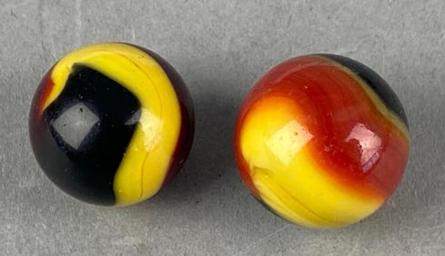 Group of 2 Peltier Glass Co. Glass Marbles