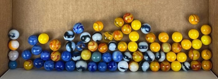 Group of Flat Bananas and Blue Blood Corkscrew Akro Agate Marbles