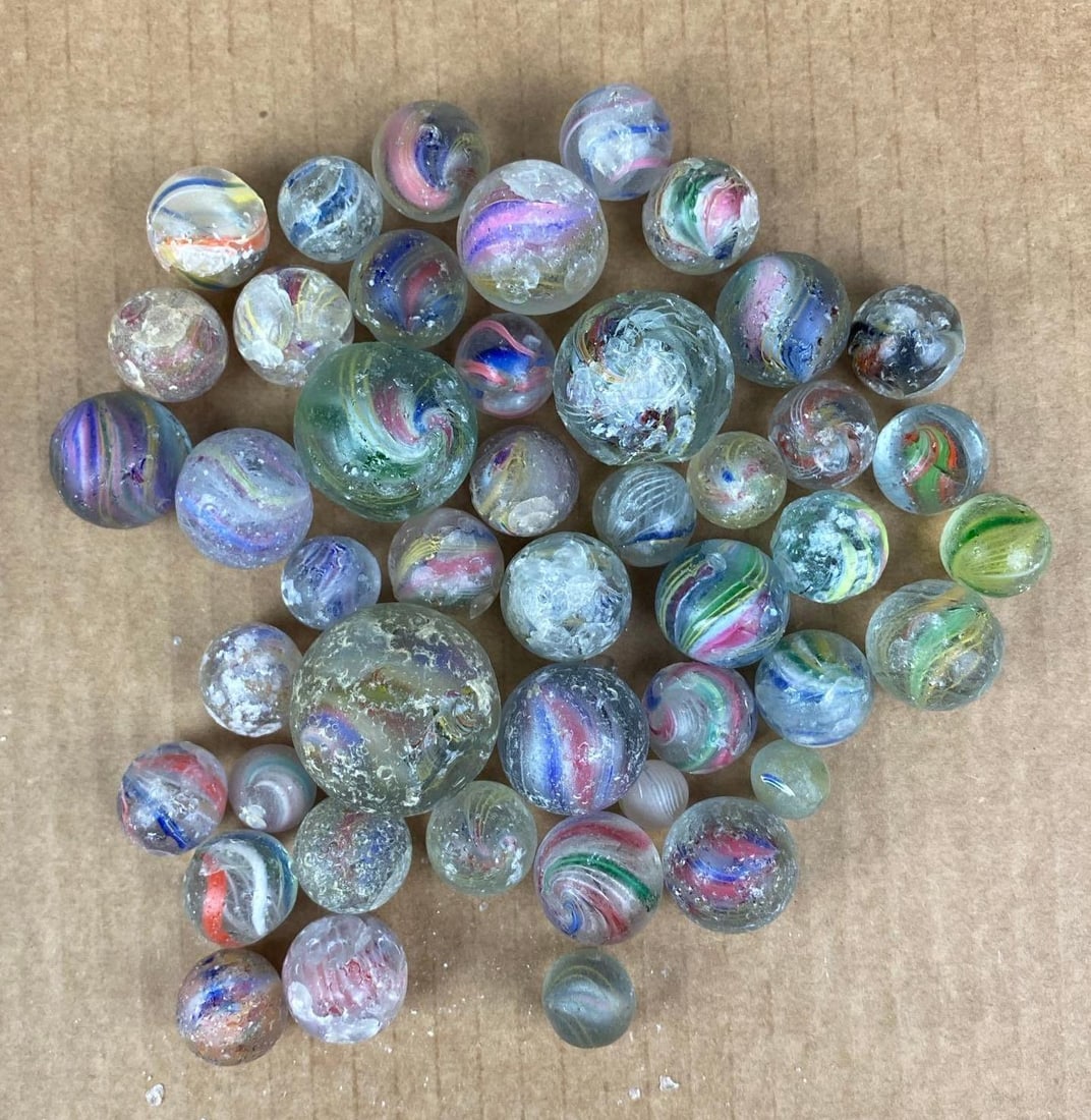 Group of Swirl Marbles: All are chipped. Largest measures 1.22 inches