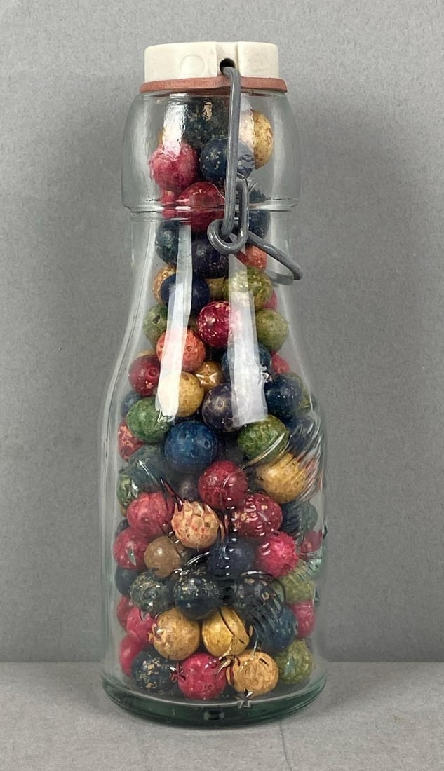 Group of Pottery Marbles: Container measures H 7 1/2 x W 2 3/4 x D 2 3/4 inches