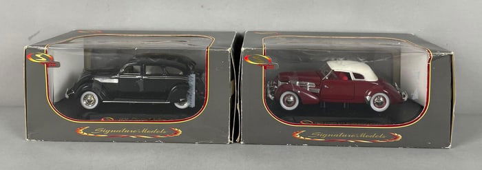 Group of 2 Signature Models Die-Cast Vehicles