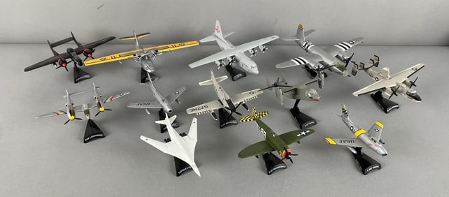 Group of Die-Cast Airplanes with Stands