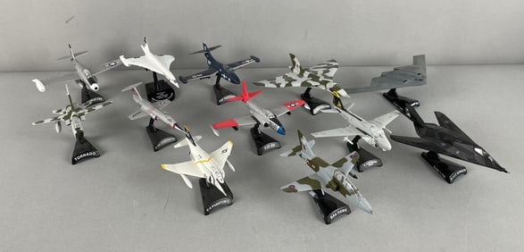 Group of Die-Cast Airplanes with Stands