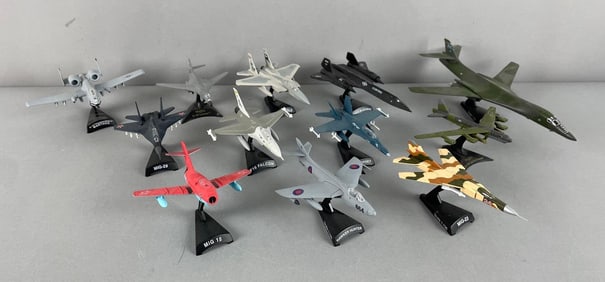 Group of Die-Cast Airplanes with Stands